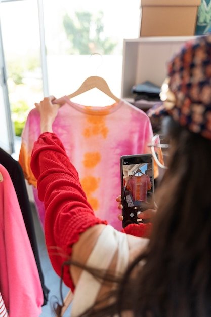 Attendees at a sustainable swap meet sorting through clothes, displaying engagement and excitement. Focus on diversity and community.