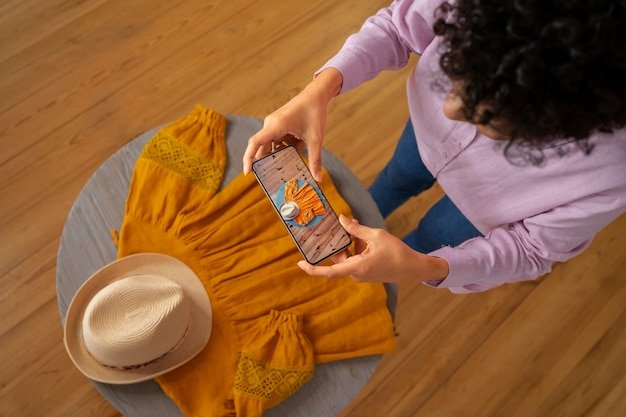 A person uses a smartphone app to browse vintage clothing items available for purchase. The app interface is modern and user-friendly, with high-quality images of the clothing and detailed descriptions.